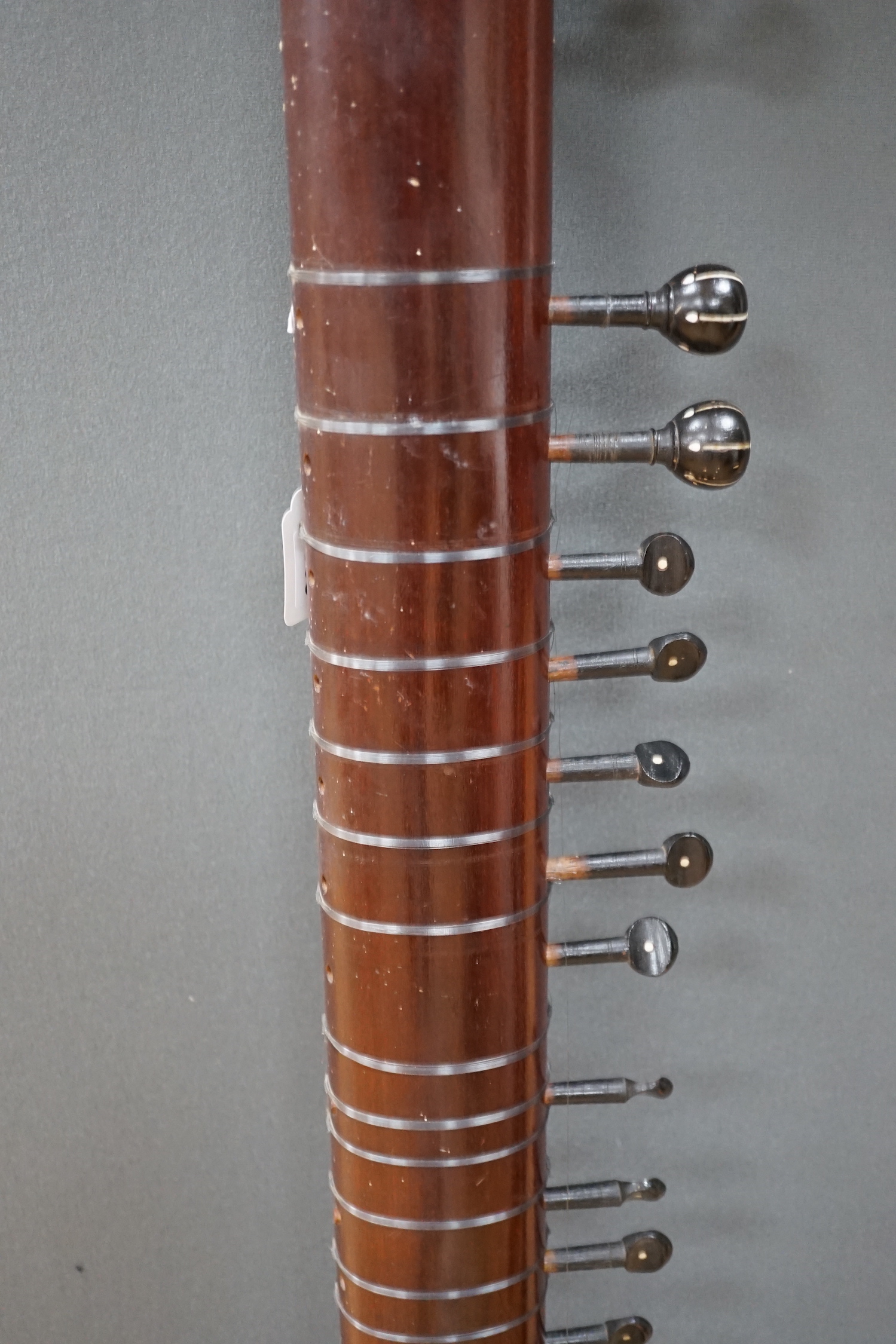 An Indian sitar, with ivory bridge and decoration, inlaid with ‘Harbhajan Grewal’ overall length 129cm CITES Submission reference LA16A6BD